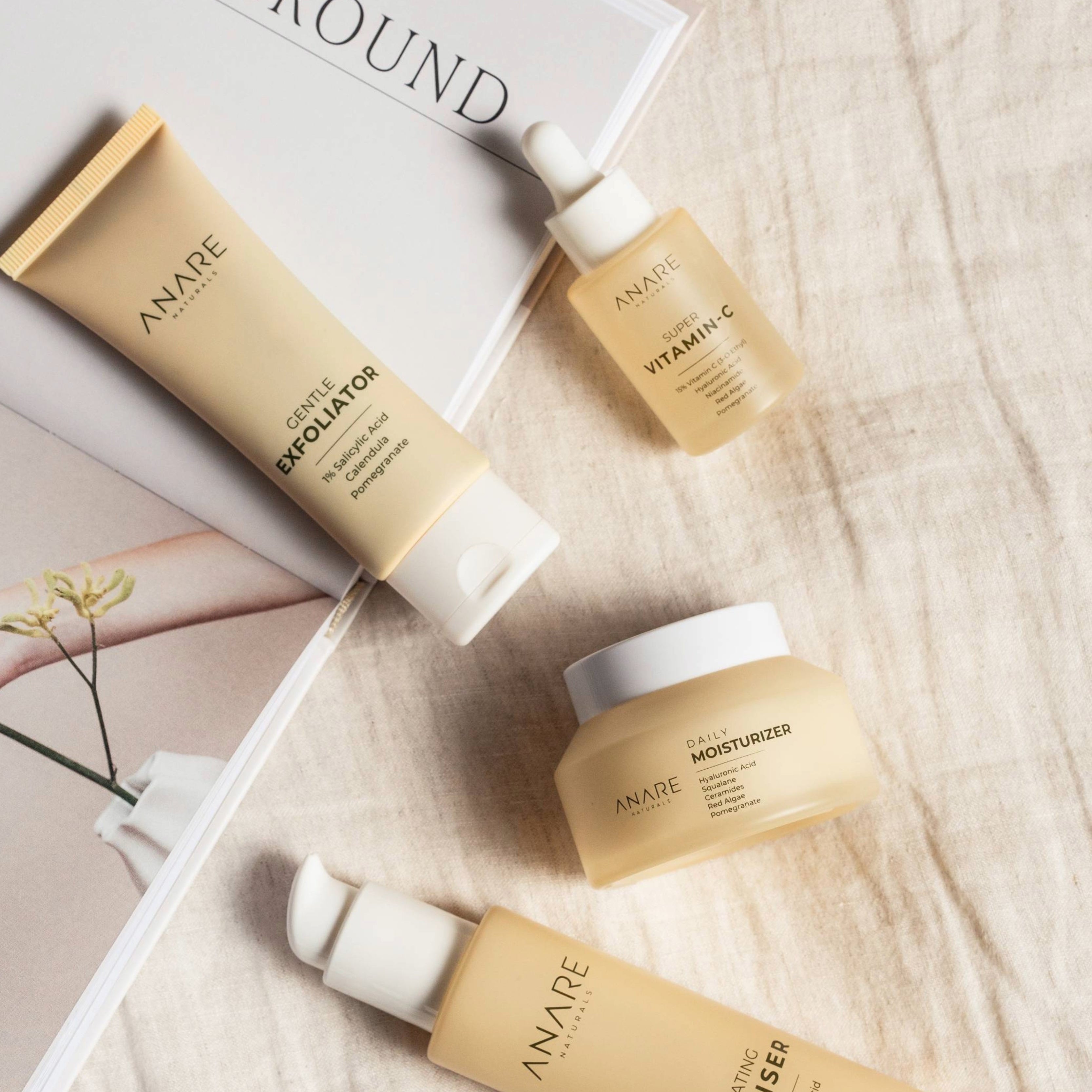 Anare Naturals skincare set with a cleanser, exfoliator, Serum and moisturizer for healthy and radiant skin.
